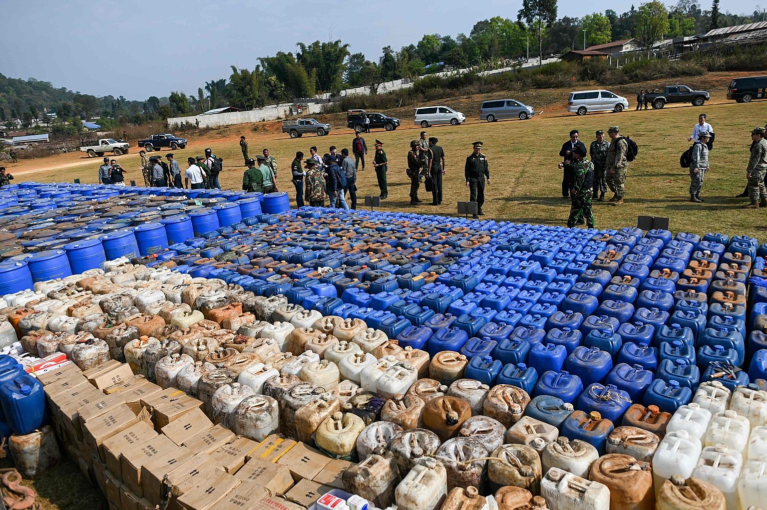 The seized drugs displayed to invited military personnel and the media in Kawnghka village in Myanmar's Shan state on Friday. The haul was worth nearly US$100 million (S$138 million) in Myanmar, the army said. PHOTO: AGENCE FRANCE-PRESSE