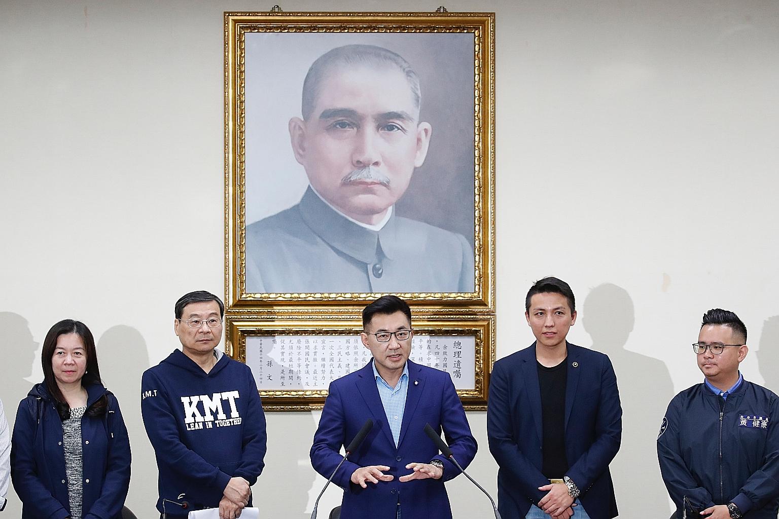 Newly elected Kuomintang chairman Chiang Chi-chen speaking after the party's election in Taipei yesterday. The party's Central Standing Committee had also resigned over the general election defeat in January, and 32 new members were elected yesterday