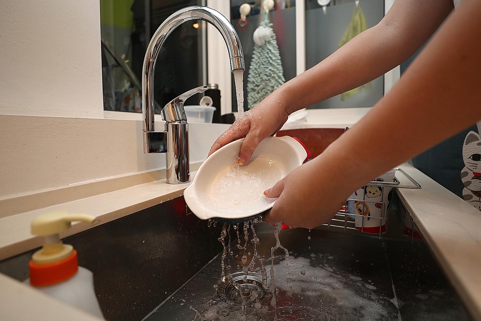 Households with maids consume 20 per cent more water compared with households without them, a PUB survey has found. PHOTO ILLUSTRATION: BENJAMIN SEETOR