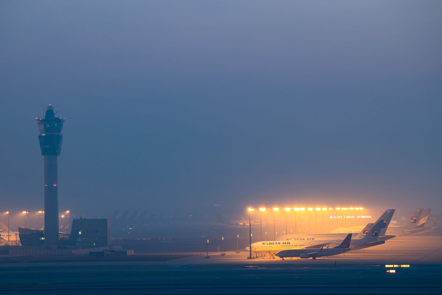 Korean Air planes at Incheon International Airport in South Korea on Monday. Korean Air president Woo Kee-hong said more than 80 per cent of the carrier's international capacity has been cut as a result of global travel restrictions, compared with an