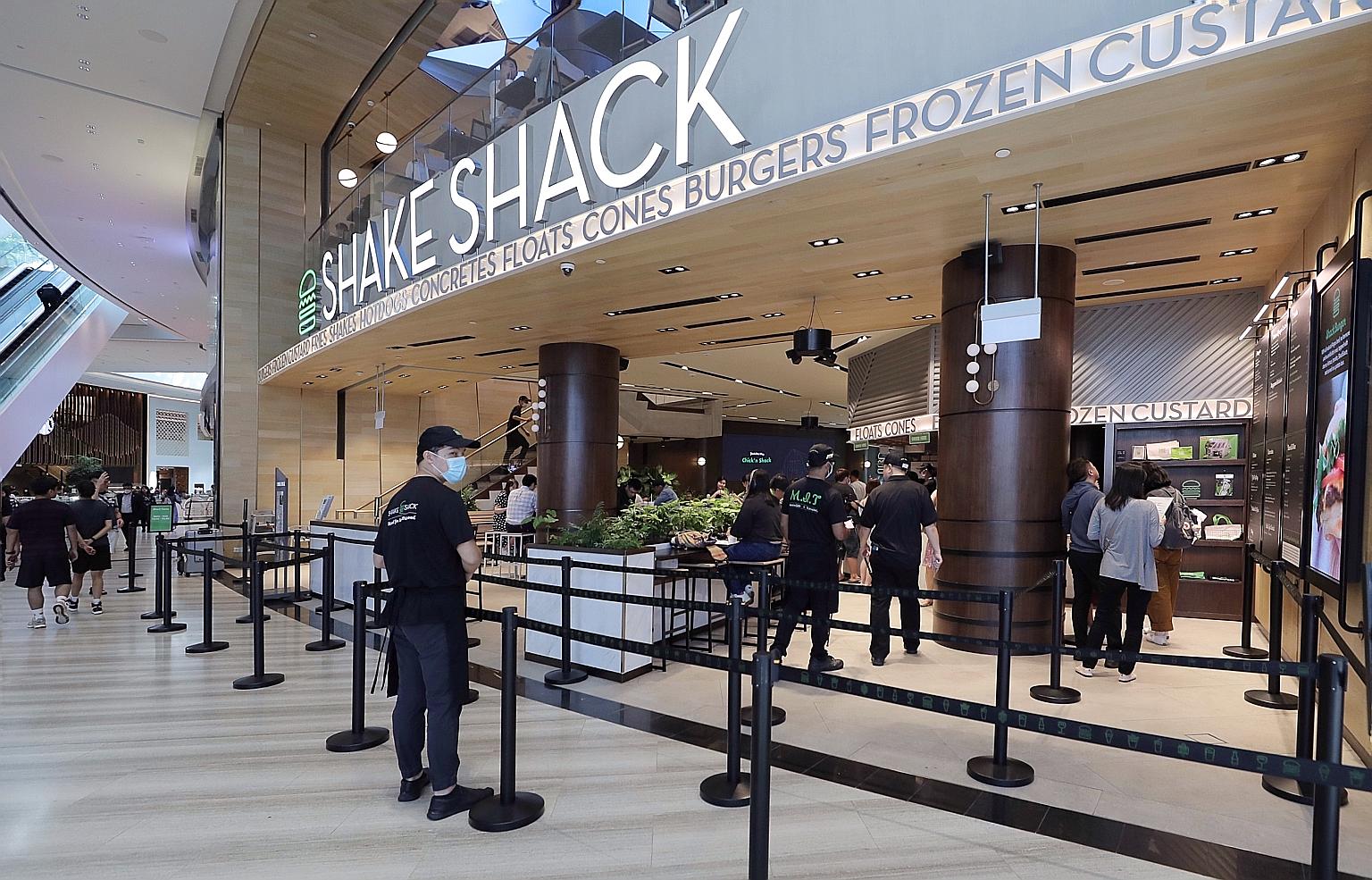 The near-empty queueing area at the Shake Shack burger outlet at Jewel Changi Airport last month. Fears about the coronavirus outbreak have prompted many people to stay away from crowded public places, and food businesses have taken a huge hit. Econo