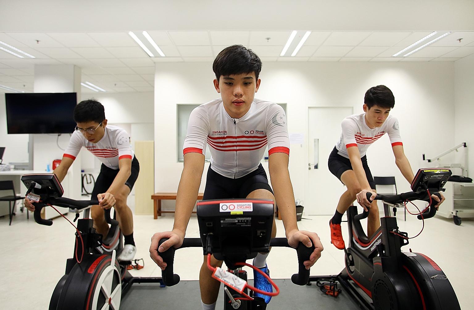 National training squad members (from far left) Darren Lim, 22, Samuel Leong, 18, and Tim Schmidt, 19, all aim to race professionally. PHOTO: LIANHE ZAOBAO