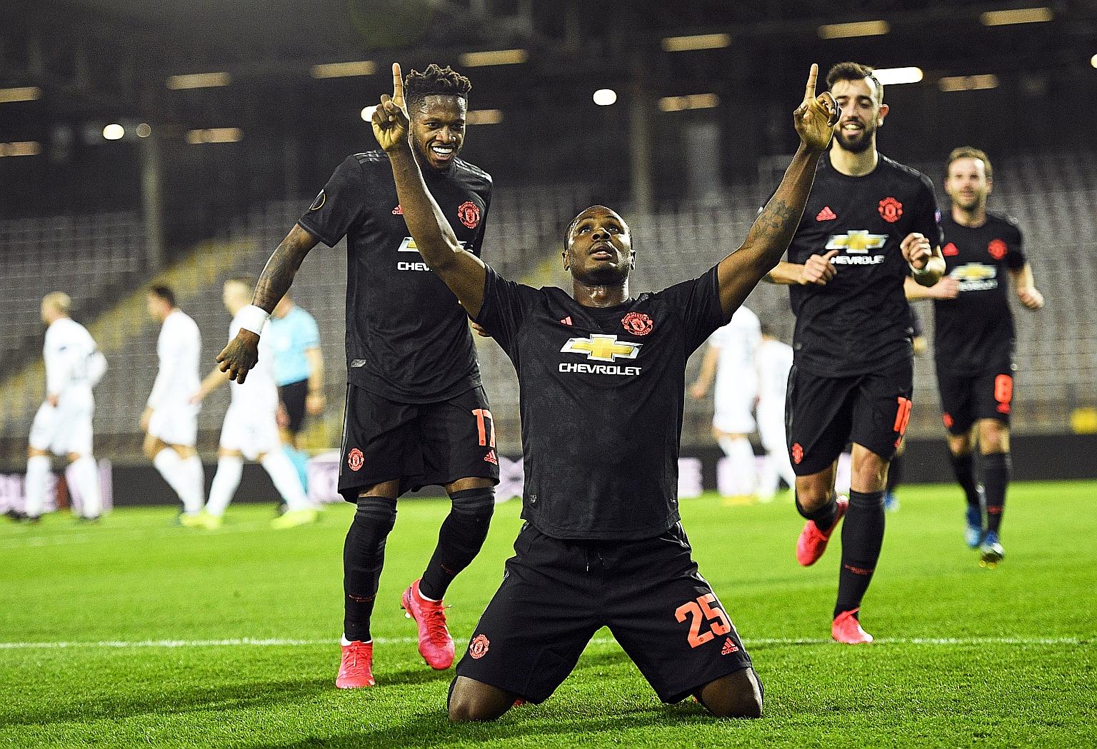 Odion Ighalo raising his hands after opening the scoring in Manchester United's 5-0 win over Lask Linz in the Europa League on Thursday night. PHOTO: EPA-EFE