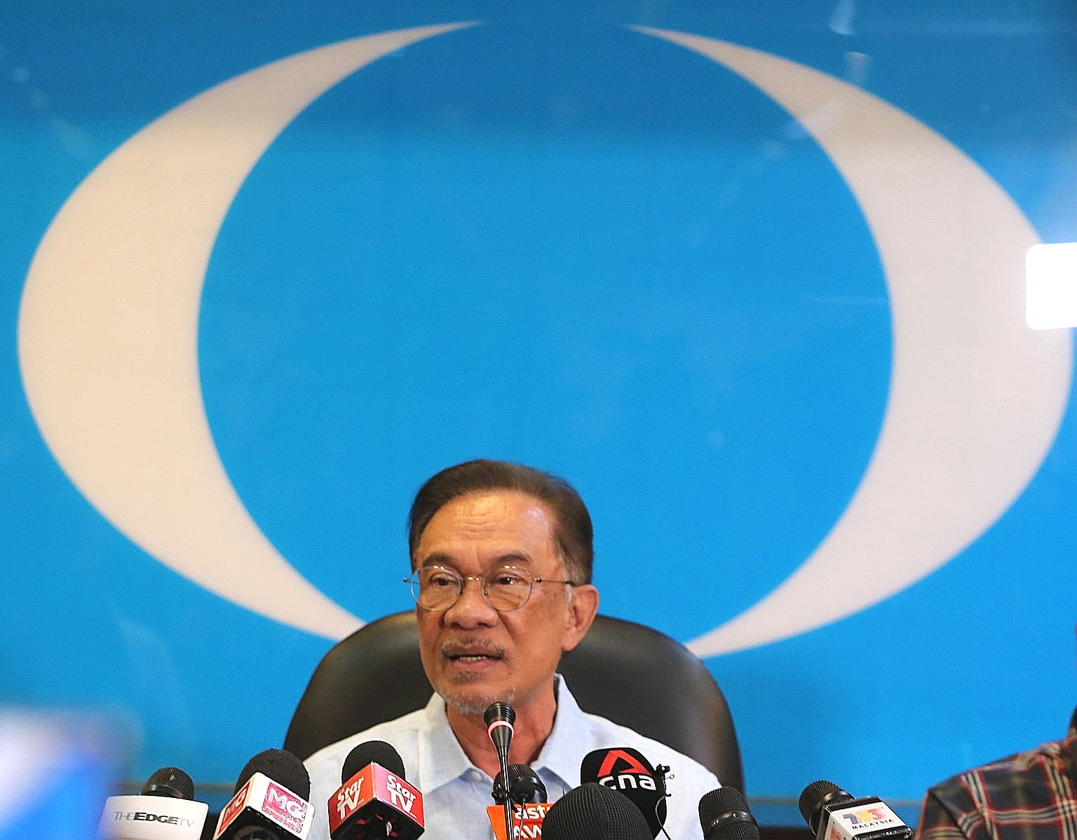 Parti Keadilan Rakyat president Anwar Ibrahim, seen here at a press conference in Petaling Jaya yesterday, has refused to respond to jibes made against him by former Malaysian prime minister Mahathir Mohamad, who blamed his "impatience" to become pre