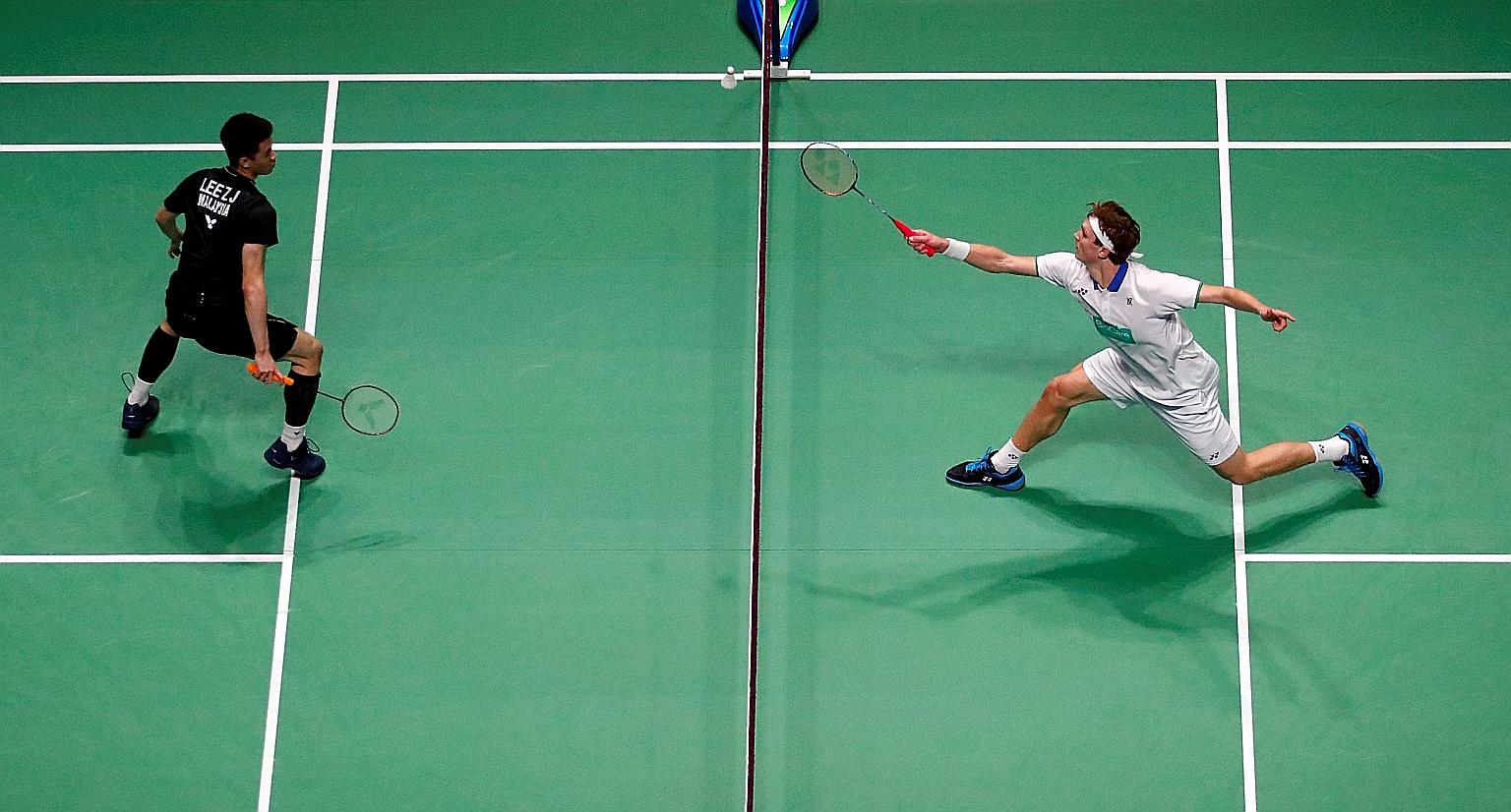 Malaysia's world No. 13 Lee Zii Jia (left), the 2019 SEA Games gold medallist, fell at the penultimate hurdle in the All England Open in Birmingham where he lost 21-17, 13-21, 19-21 to Denmark's Viktor Axelsen in the semi-finals yesterday. The 21-yea