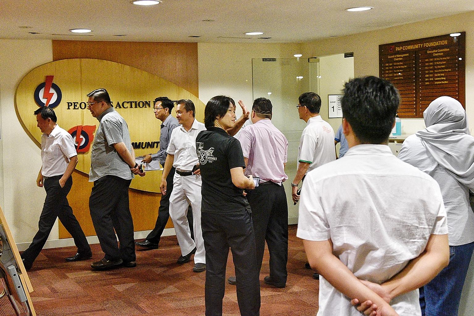 Senior People's Action Party cadres at the party's headquarters in Bedok last Friday. They had met that evening, hours after the new electoral boundaries were announced.