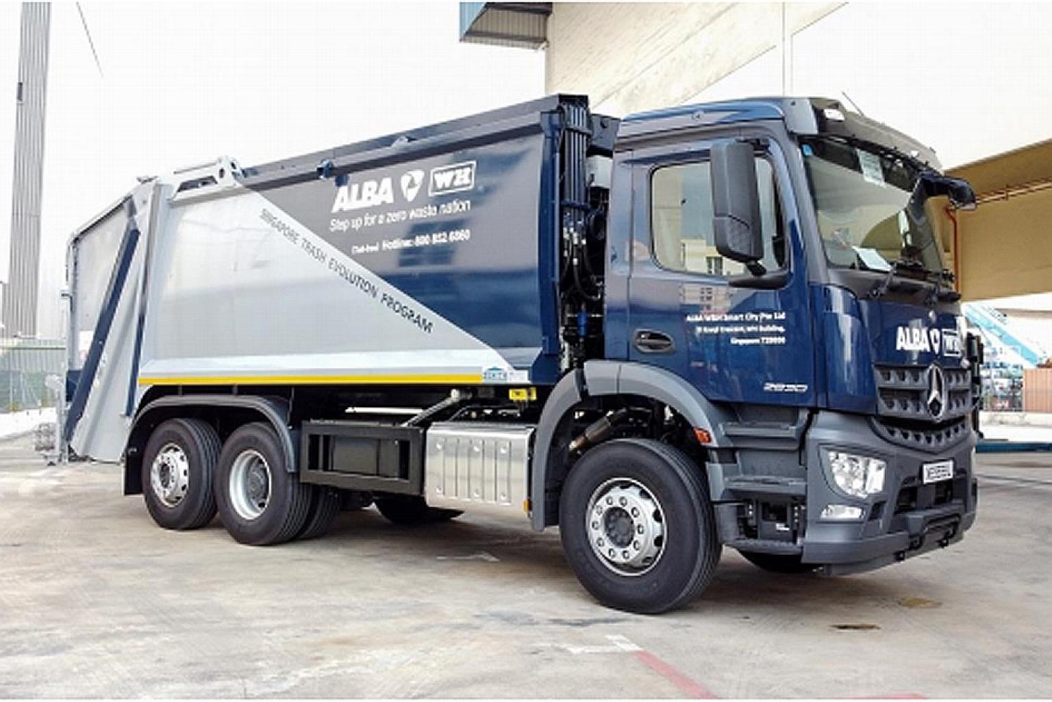 The new environmentally friendly waste collection trucks from Alba W&H have solar mats installed on their roofs (far right) to reduce fuel consumption and carbon emissions. PHOTOS: ALBA W&H