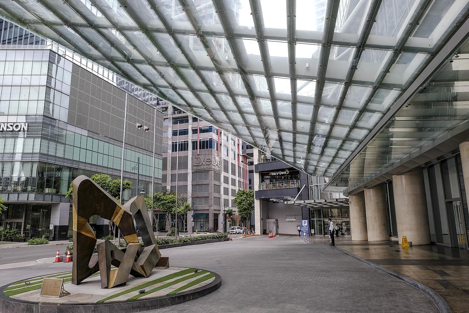 The Philippine Stock Exchange tower at Bonifacio Global City in Metro Manila. The halt in stock trading took place after several bourses around the world closed trading floors or paused trade.
