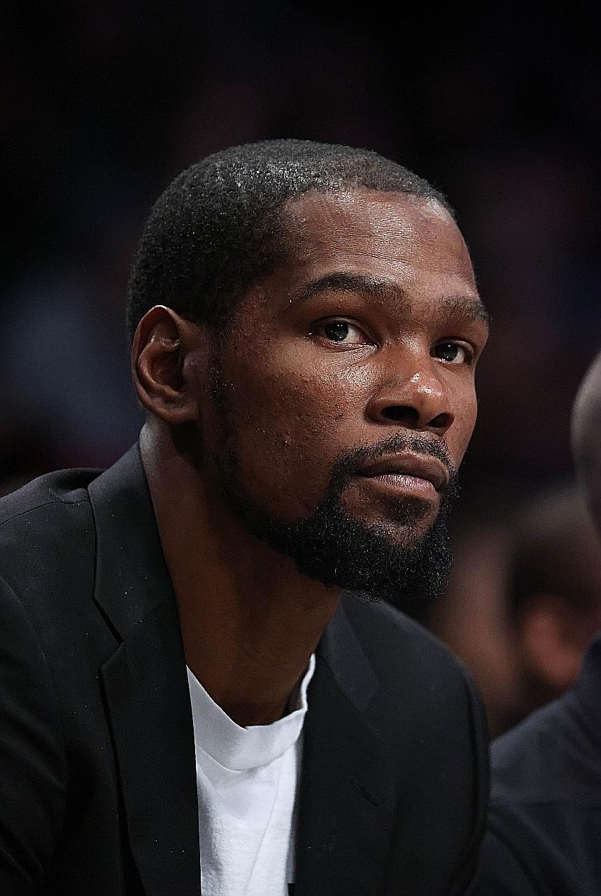Kevin Durant, one of four Nets players to test positive, has yet to play this season because of an Achilles tendon injury.