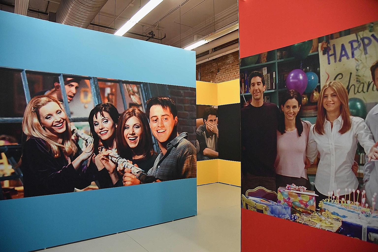 Posters of the Friends cast at the Friends New York City Pop-Up press preview in New York last September. The cast members were supposed to film their reunion next week but it has been delayed.
