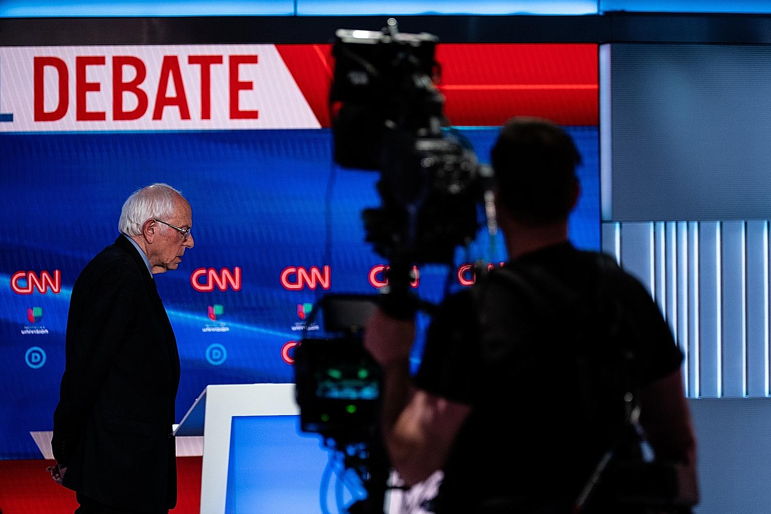 Senator Bernie Sanders at the Democratic primary debate in Washington on Sunday. Mr Sanders faces a very steep battle to overtake his rival Joe Biden, given the former vice-president's substantial lead in national opinion polls among Democrats and in