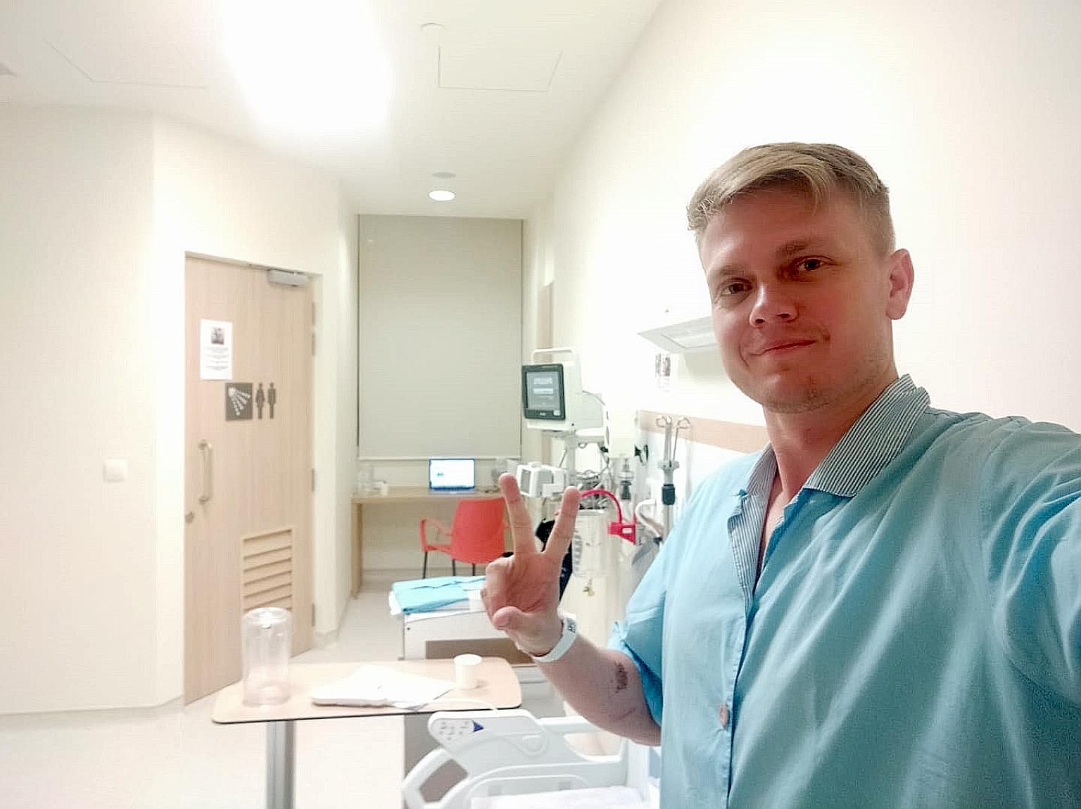Mr Simon Gwozdz, 29, the founder of local tech start-up Equatorial Space Industries, in his isolation room at Ng Teng Fong General Hospital on Friday. He has been warded there since Monday. PHOTO: COURTESY OF SIMON GWOZDZ