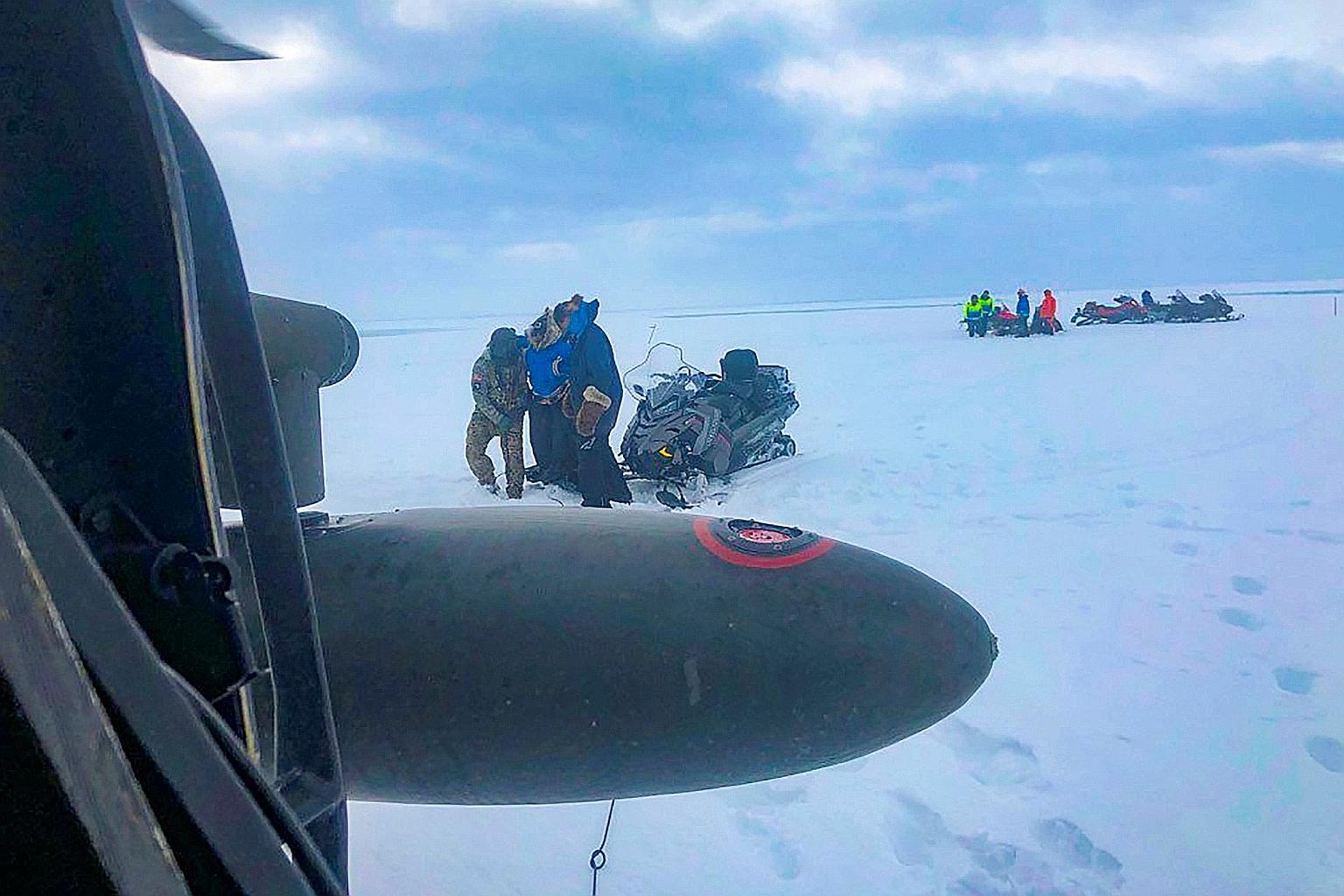The stranded trio activated their emergency beacons and were plucked from the submerged trail by an Alaska National Guard helicopter team, just 35km from the finish line. They were taken to a hospital for checks and released. Their dogs were also res
