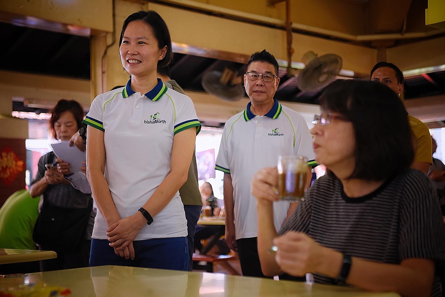 Former RSAF chief of staff - air staff Gan Siow Huang (left) spotted at a walkabout at a coffee shop in Bishan Street 24 yesterday. ST PHOTO: MARK CHEONG