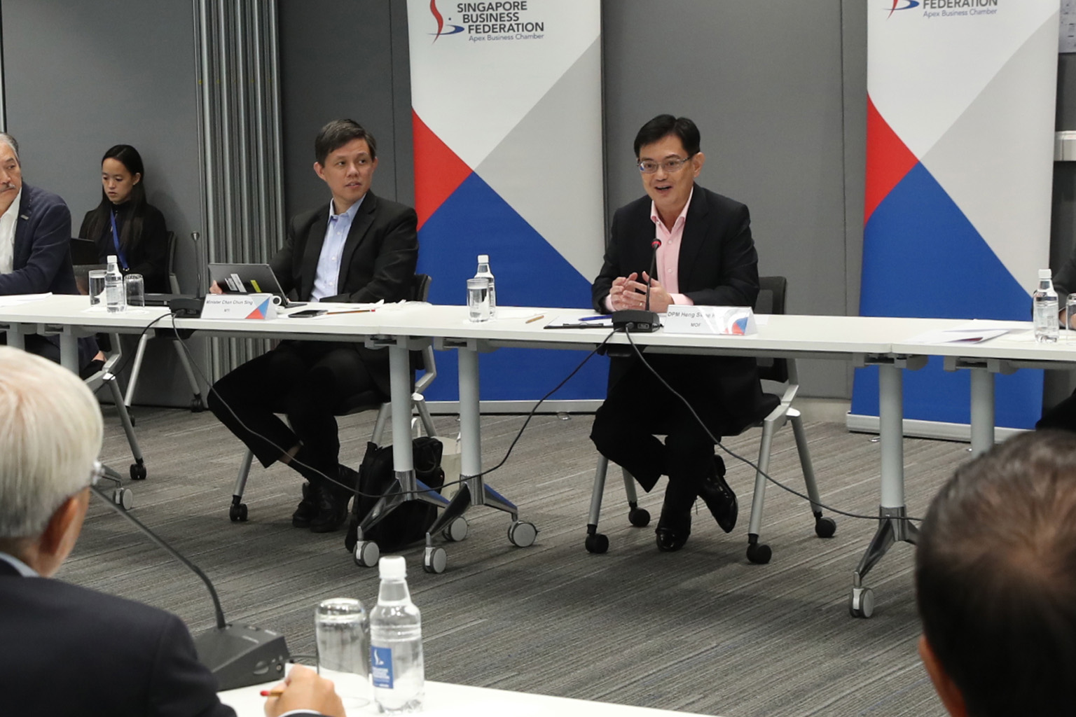 Deputy Prime Minister Heng Swee Keat (at right) and Trade and Industry Minister Chan Chun Sing at a closed-door dialogue organised by the Singapore Business Federation with more than 40 business leaders last Friday. PHOTO: MCI