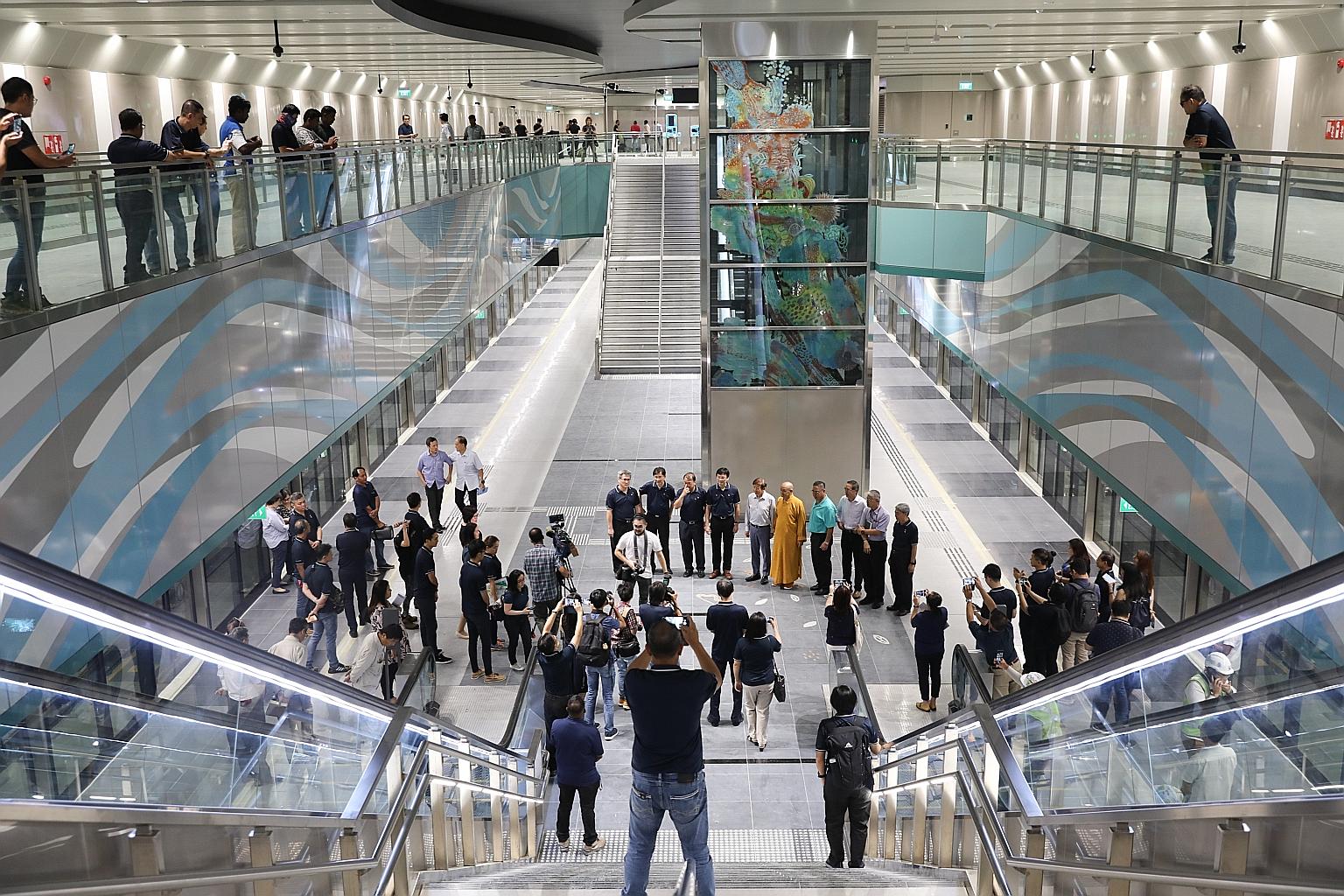 Transport Minister Khaw Boon Wan visiting Bright Hill MRT station, part of Stage 2 of the Thomson-East Coast Line, yesterday. Beside him is Venerable Kwang Sheng, Abbot of Kong Meng San Phor Kark See Monastery.