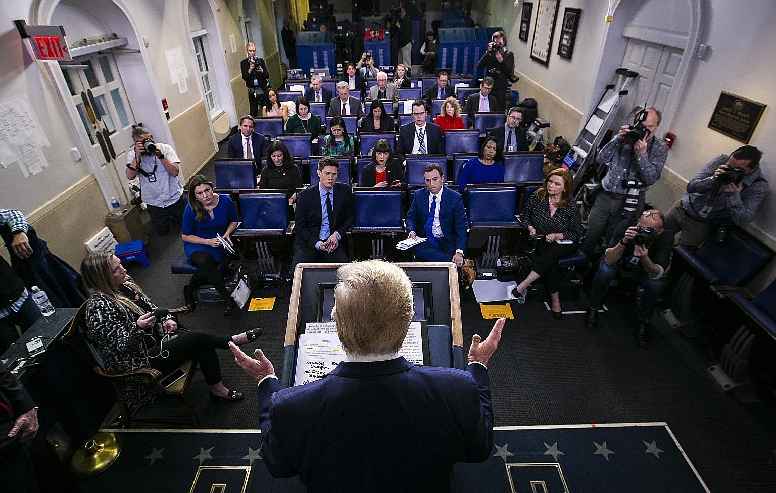 US President Donald Trump speaking during a coronavirus task force news conference at the White House on Sunday. Nearly one-third of Americans are in various phases of virtual lockdown, including in the three biggest cities of New York, Los Angeles a