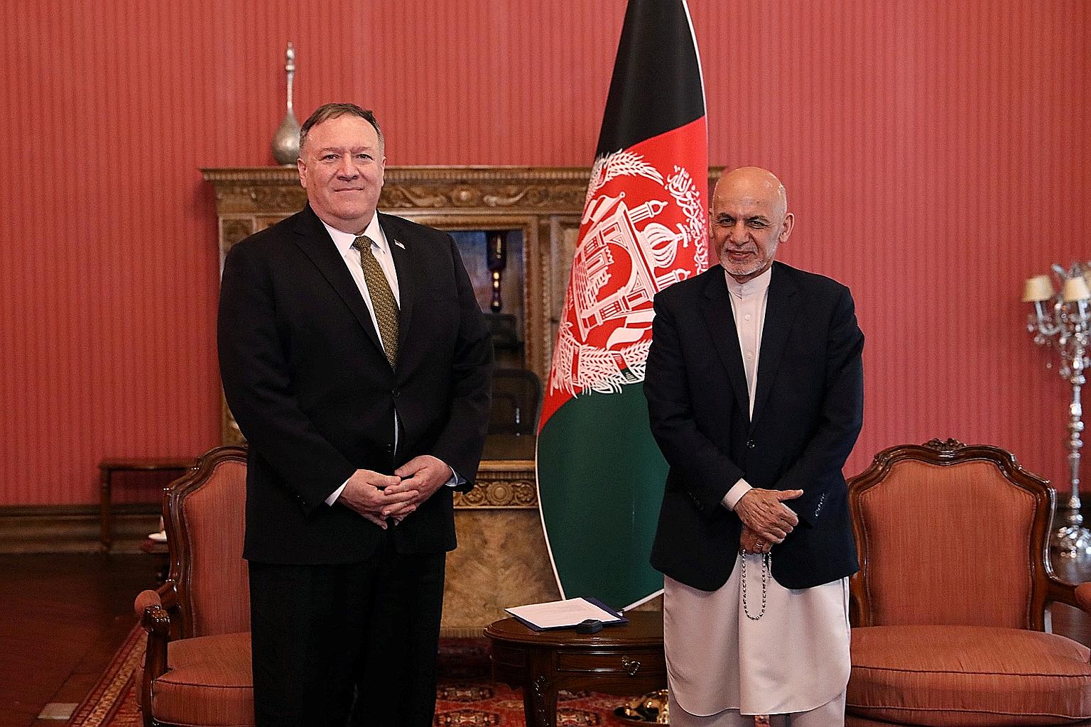 US Secretary of State Mike Pompeo and Afghanistan's President Ashraf Ghani meeting in Kabul yesterday. Mr Pompeo is trying to help resolve a weeks-long political deadlock between President Ghani and his long-time rival Abdullah Abdullah, who is conte
