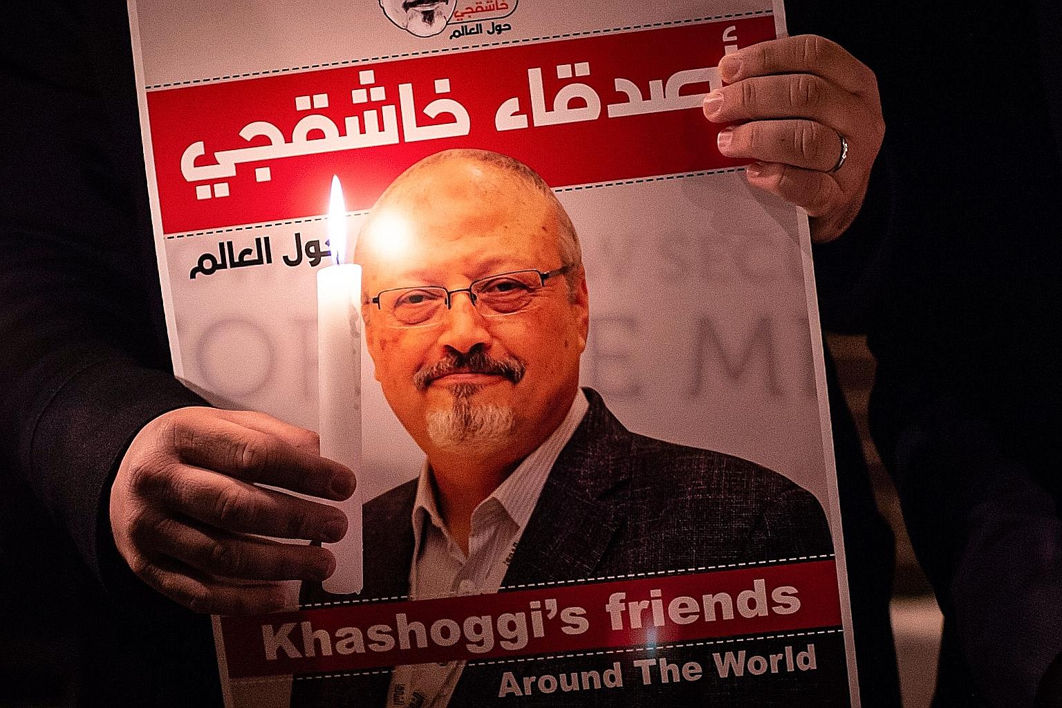 A poster of Mr Jamal Khashoggi seen at a gathering outside the Saudi consulate in Istanbul in 2018. The journalist's murder drew condemnation worldwide. PHOTO: AGENCE FRANCE-PRESSE
