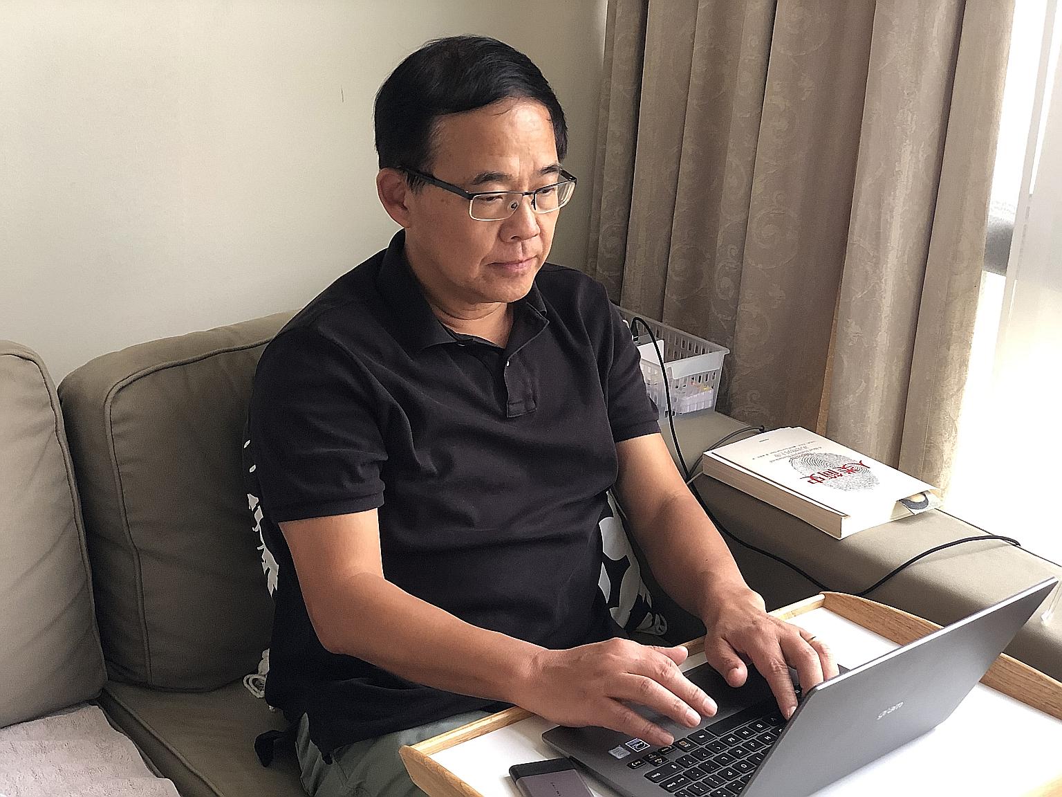 Professor Wang Linfa, director of the emerging infectious diseases programme at Duke-NUS Medical School, working at home while on self-imposed home quarantine after a visit to Wuhan, China.