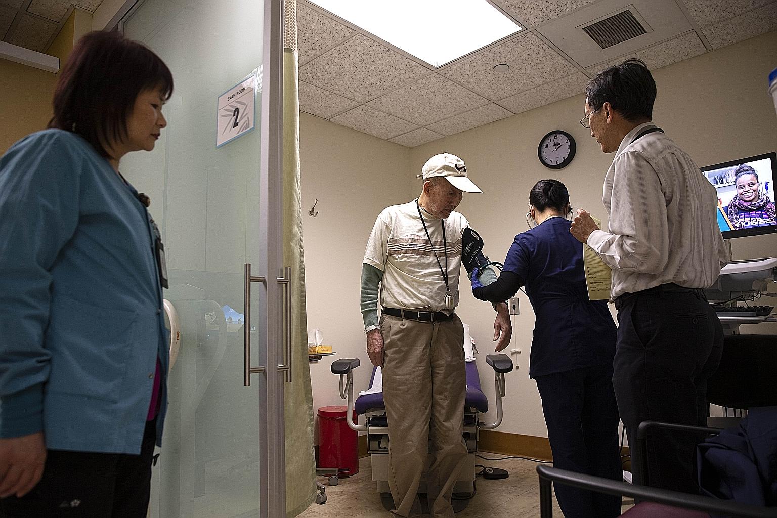 With the fortunes of the rich being affected by the stock market crash, non-profit organisations in the US, such as this community healthcare centre in Seattle, will face funding problems.