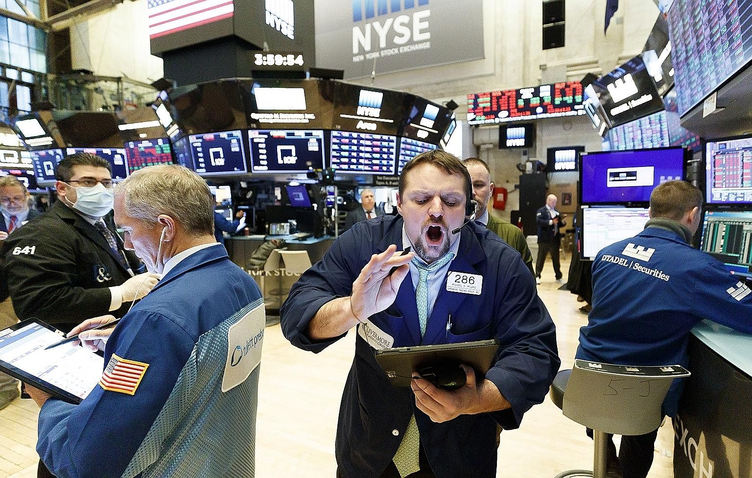 Traders on the floor of the New York Stock Exchange. While much of Asia is healing, the worst could be yet to come for Europe and the Americas. Incoherent and uncoordinated policy approaches to disease management have seen the US overtake China and I