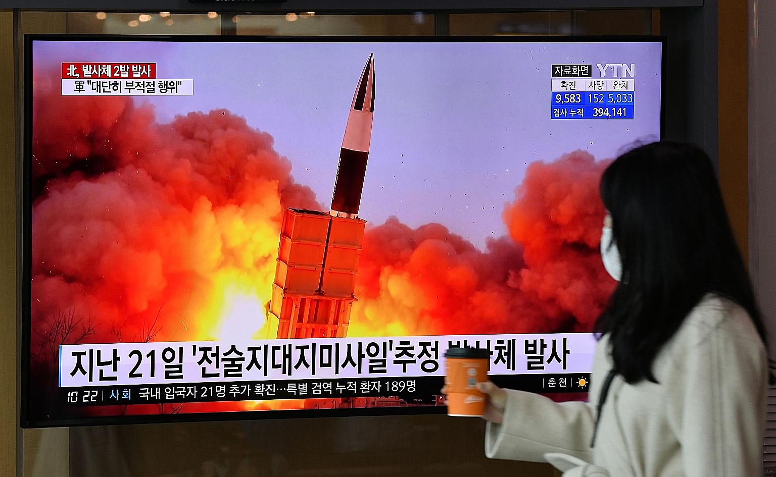 File footage of a North Korean missile test during a news broadcast in Seoul, South Korea, on Sunday. North Korea fired what appeared to be two short-range ballistic missiles off its east coast that day, a test which its state media said was a succes