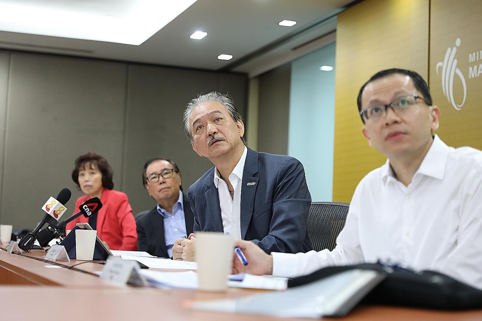 From left: National Trades Union Congress president Mary Liew, National Wages Council chairman Peter Seah, Singapore National Employers Federation president Robert Yap and Permanent Secretary for Manpower Aubeck Kam at yesterday's media conference. S