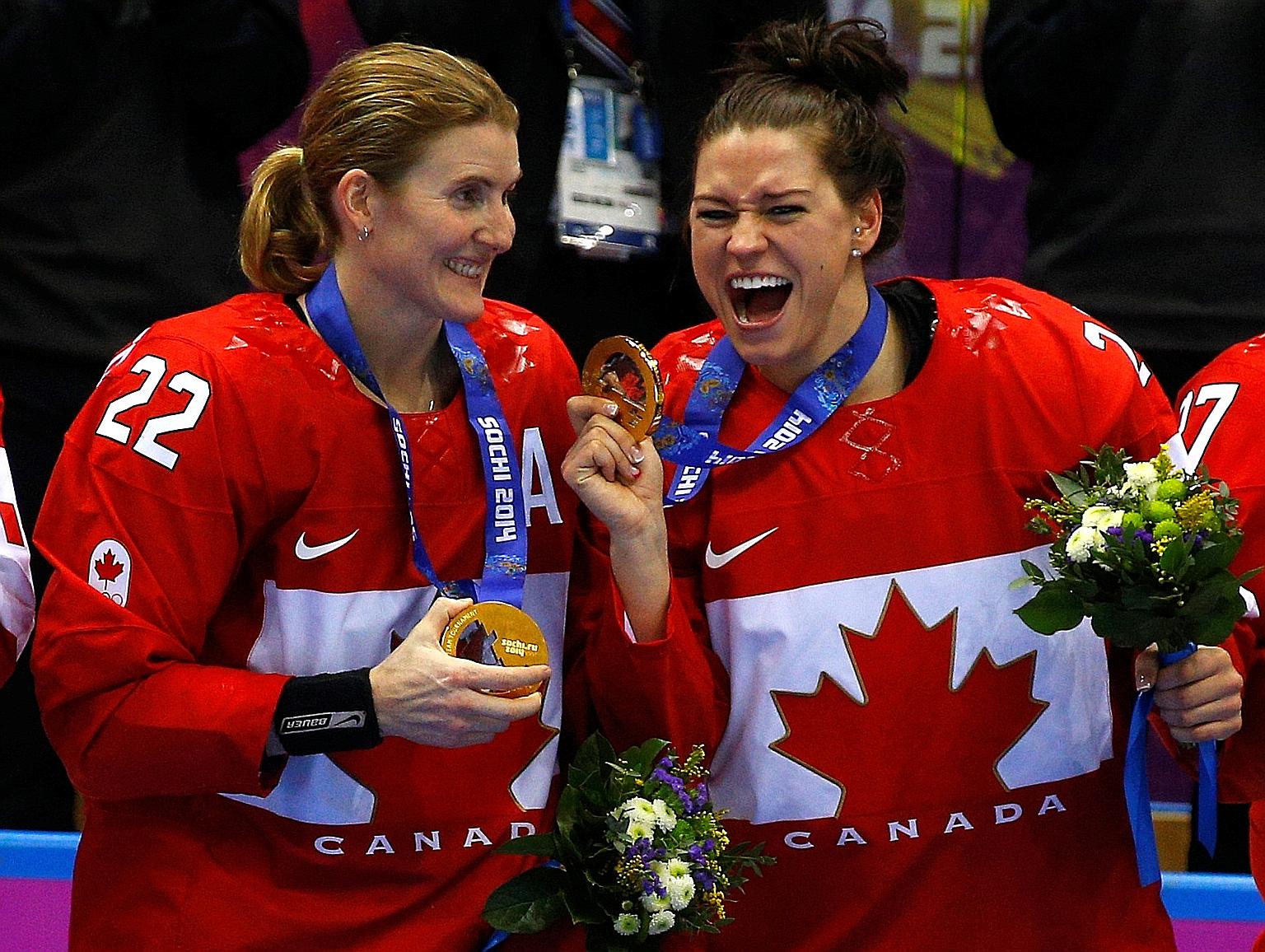 Hayley Wickenheiser (left, with Canada ice hockey teammate Natalie Spooner at the 2014 Sochi Olympics) was one of the fierce critics of the IOC. PHOTO: REUTERS