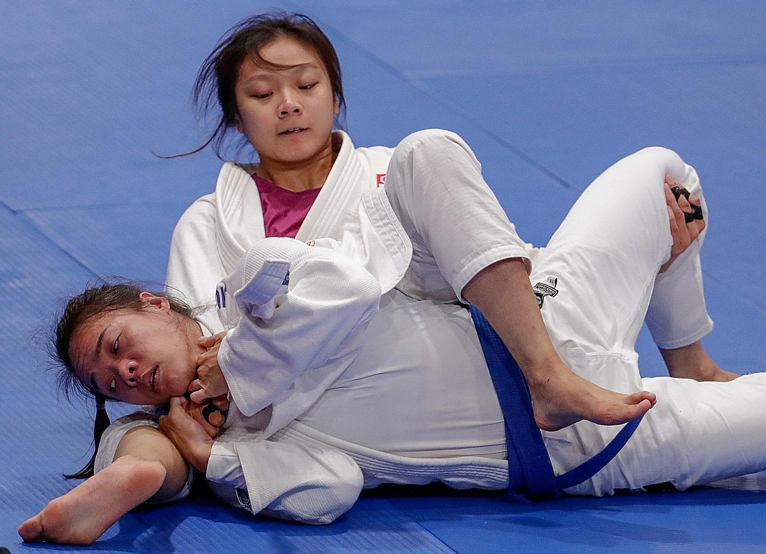 Constance Lien proving too strong for Vietnam's Nguyen Ngoc Tu in the ne-waza Under-62kg final last year, clinching her first SEA Games gold medal. The Singaporean is one of 17 first-time recipients of the spexScholarship. PHOTO: SPORT SINGAPORE