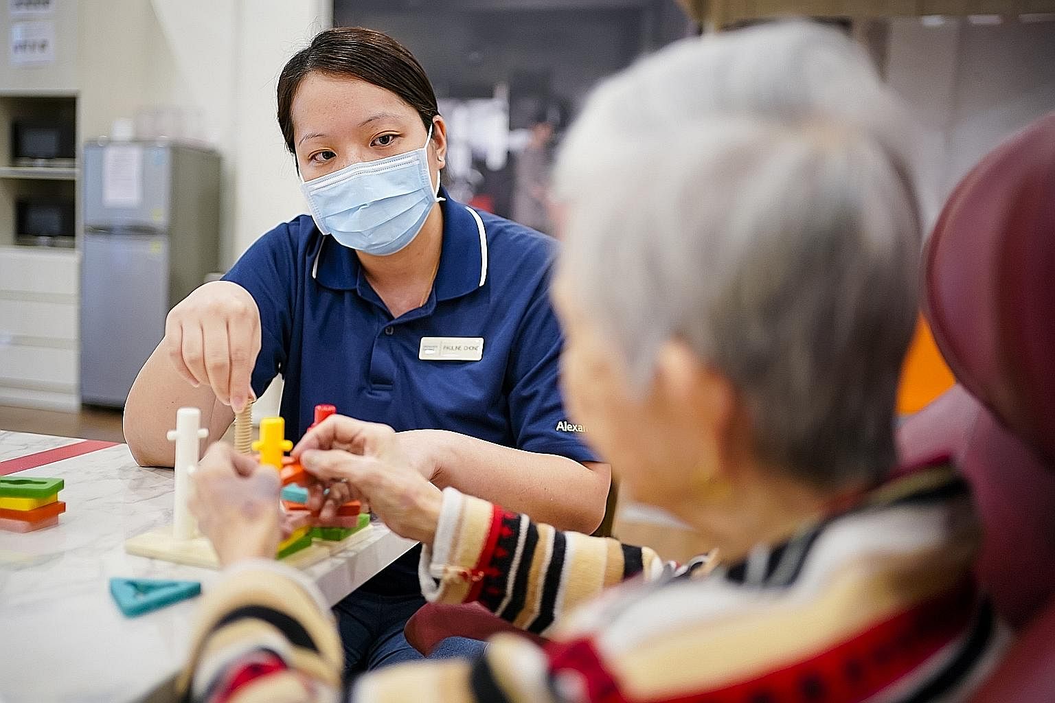 Ms Pauline Chong, 40, works as a senior nurse clinician in the general and geriatric wards at Alexandra Hospital. She caught the severe acute respiratory syndrome, or Sars, in 2003 when working as a junior nurse at the National University Hospital. N