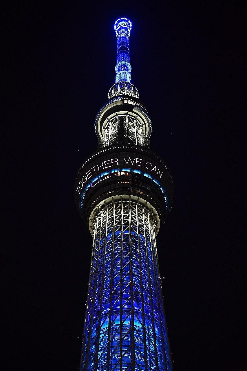 The Tokyo Skytree all lit up and sending an encouraging "Together we can all win!" message amid the pandemic.