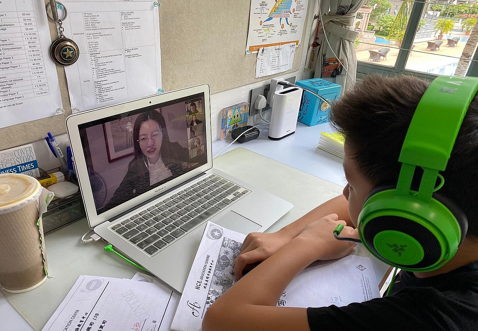 Primary 6 pupil Kyan Low taking an online Chinese language enrichment class at home on Monday.