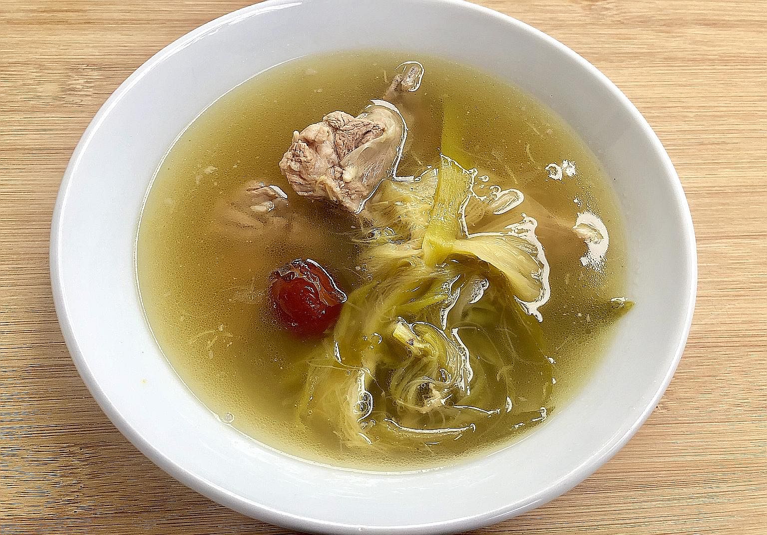 Sold in dried form, the ba wang hua - which is used in this soup (left) - is believed to help with reducing heat in the lungs in traditional Chinese medicine.