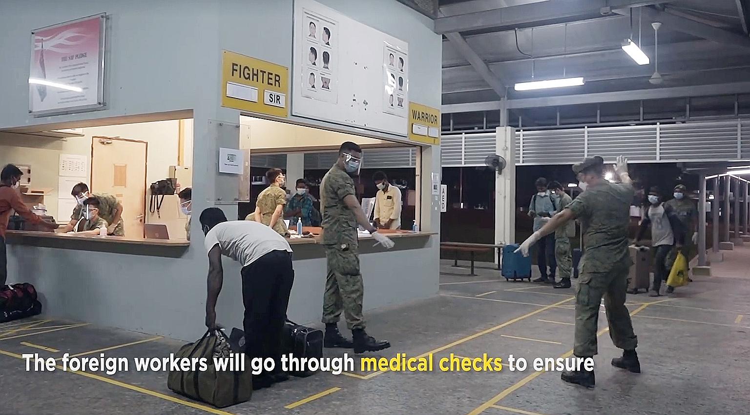 About 1,300 workers will move into two Singapore Armed Forces camps from this week, said the Ministry of Defence on Facebook last night.