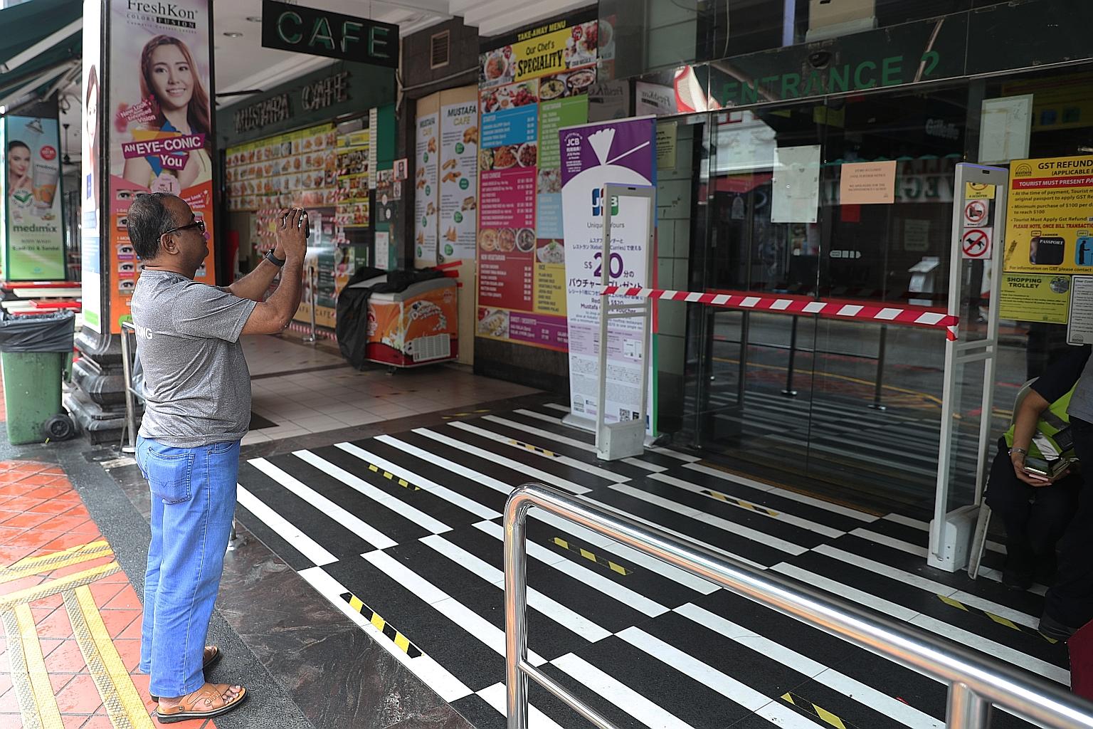 A closed and quiet Mustafa Centre last Friday, after a cluster was detected there. Foreign workers are likely to have been infected after visiting the shopping mall, where some employees had fallen ill. They transmitted the infection to their co-work