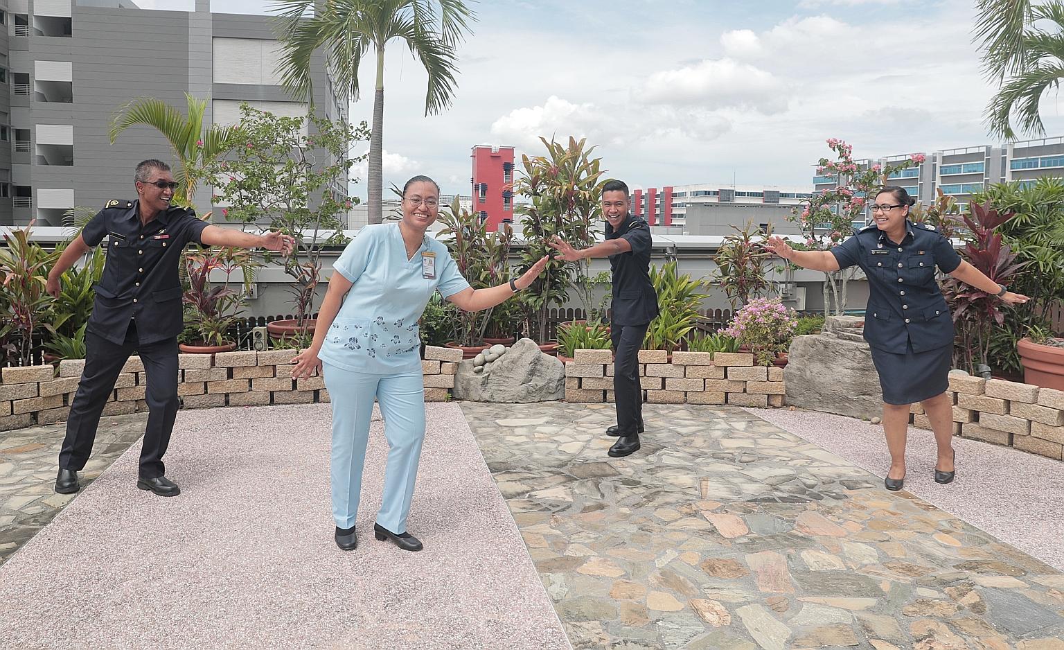 The Surani siblings: (from left) Warrant Officer Firdaus, an operations centre specialist with the SCDF; nurse clinician Fazlina, who works at Tan Tock Seng Hospital; Sergeant Faiz, a paramedic with the SCDF; and Staff Sergeant Sakinah, a ground resp