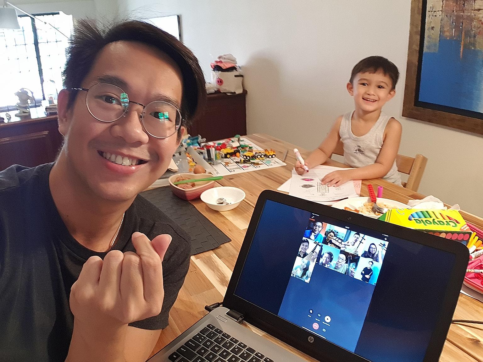 Ding Yi Music Company's assistant conductor Dedric Wong at home with his four-year-old nephew Alexander Bristow. On his laptop screen is an online group chat with fellow musicians.