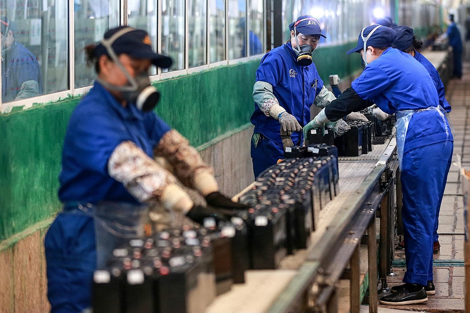 Factory activity in China rebounded last month, but weak demand from export markets has led to order cancellations. PHOTO: AGENCE FRANCE-PRESSE