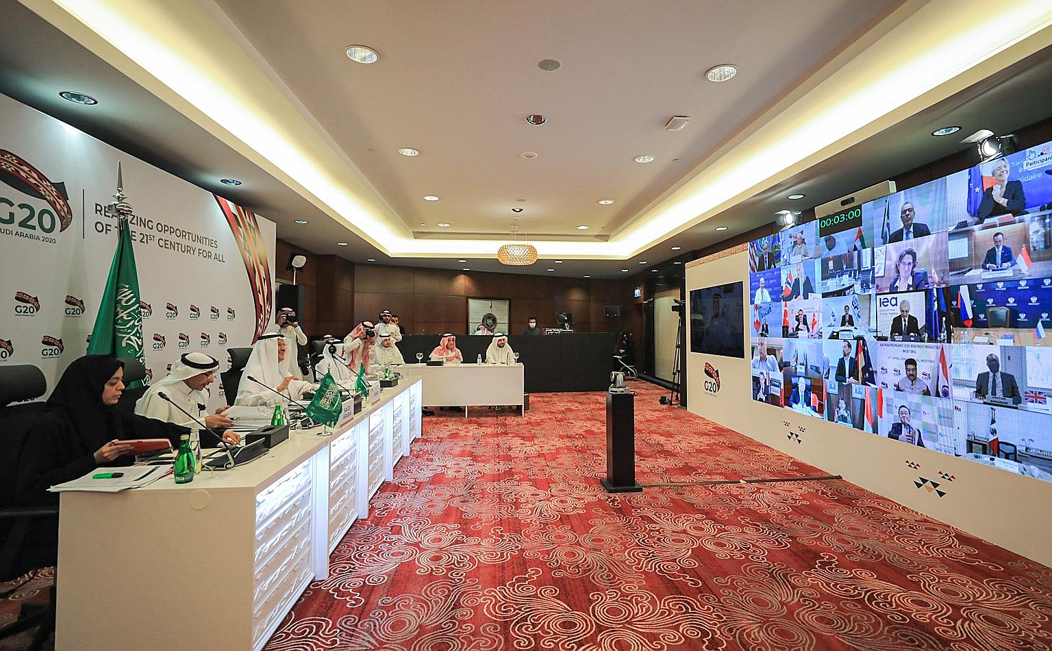 A photo released by the Saudi Energy Ministry last Friday, showing Saudi Arabia's Energy Minister Abdulaziz bin Salman (third from left) chairing a virtual extraordinary meeting of G-20 energy ministers, in Riyadh.