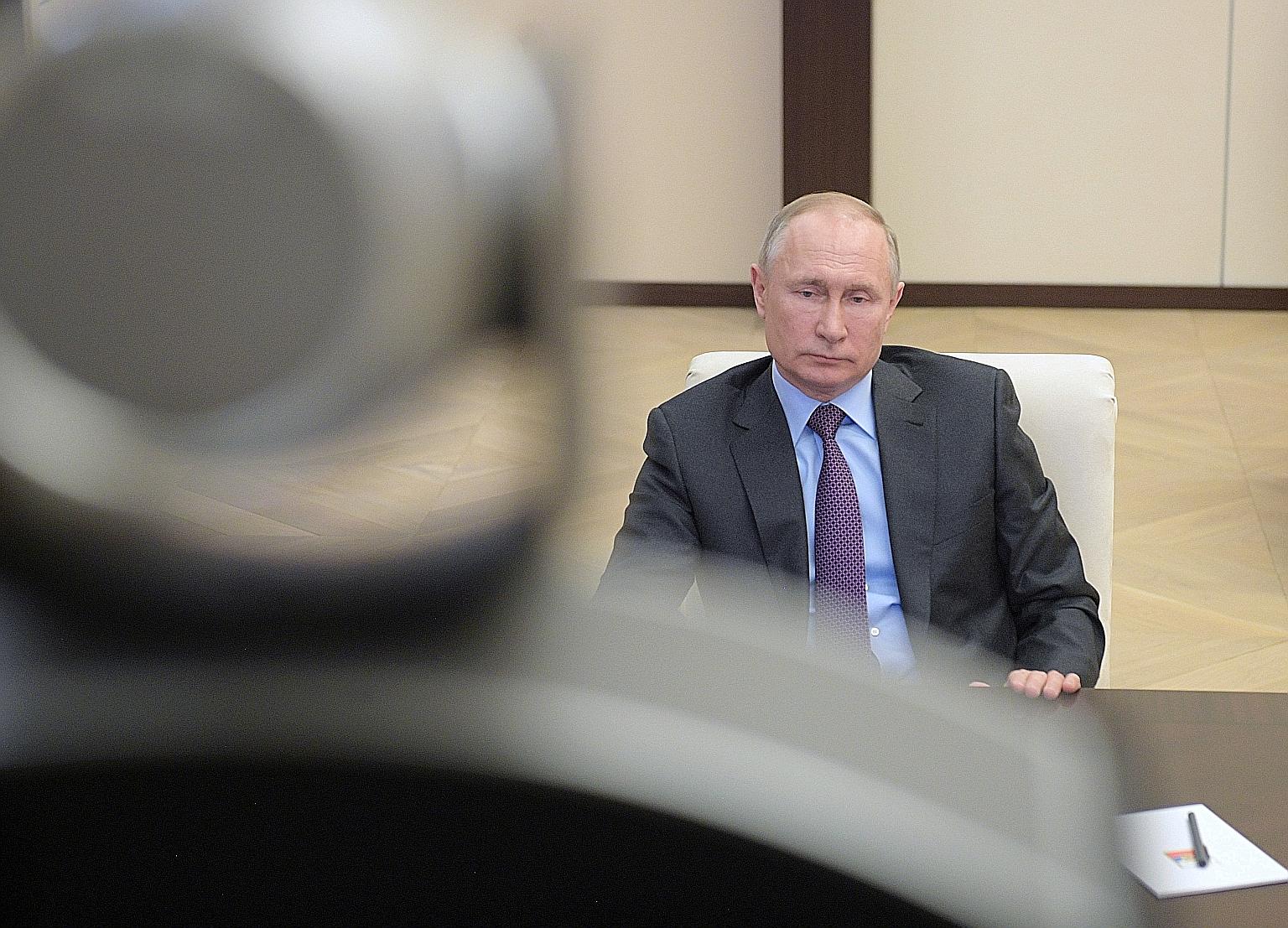 With oil markets collapsing, Russian President Vladimir Putin agreed to cut more than 2.5 million barrels a day of crude, more than four times the reduction that he turned down early last month.