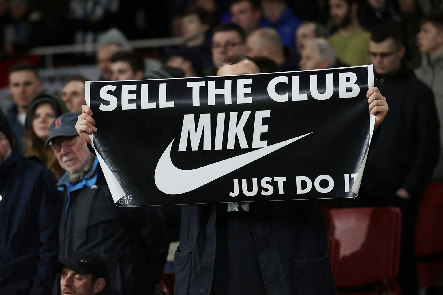 These Newcastle fans, who are clearly fed up with club owner Mike Ashley (above), could get their wish soon. British media are reporting that the club is the subject of a takeover.