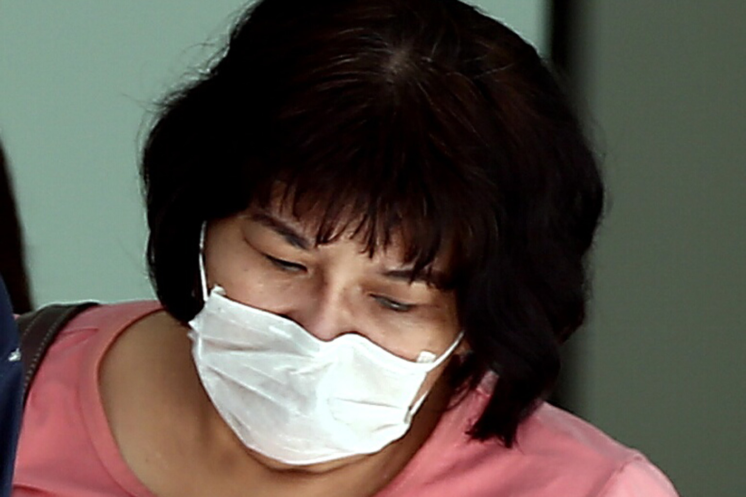 Leo Mona was sentenced to 13 weeks' jail for assaulting her neighbour, Mr Ho Wee Khuan, on Aug 10, 2017. Mr Ho, who fell and hit his head on the floor, died two days later.