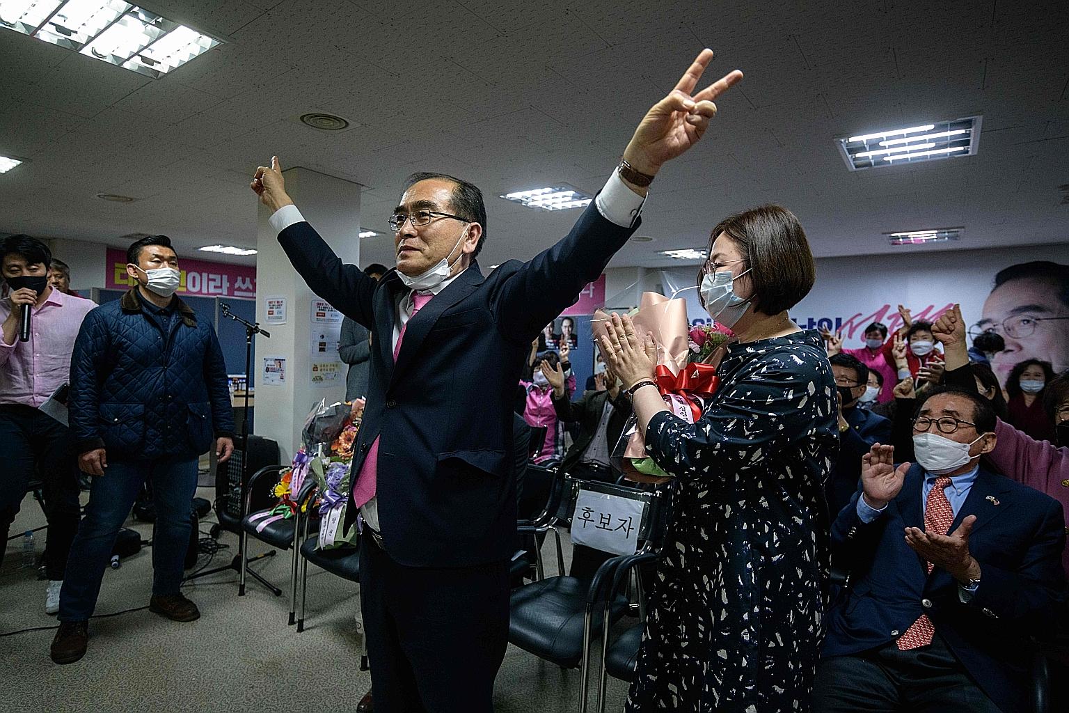 Mr Thae Yong Ho gesturing after securing a majority vote in his Gangnam constituency, at his campaign headquarters in the Gangnam district of Seoul yesterday.