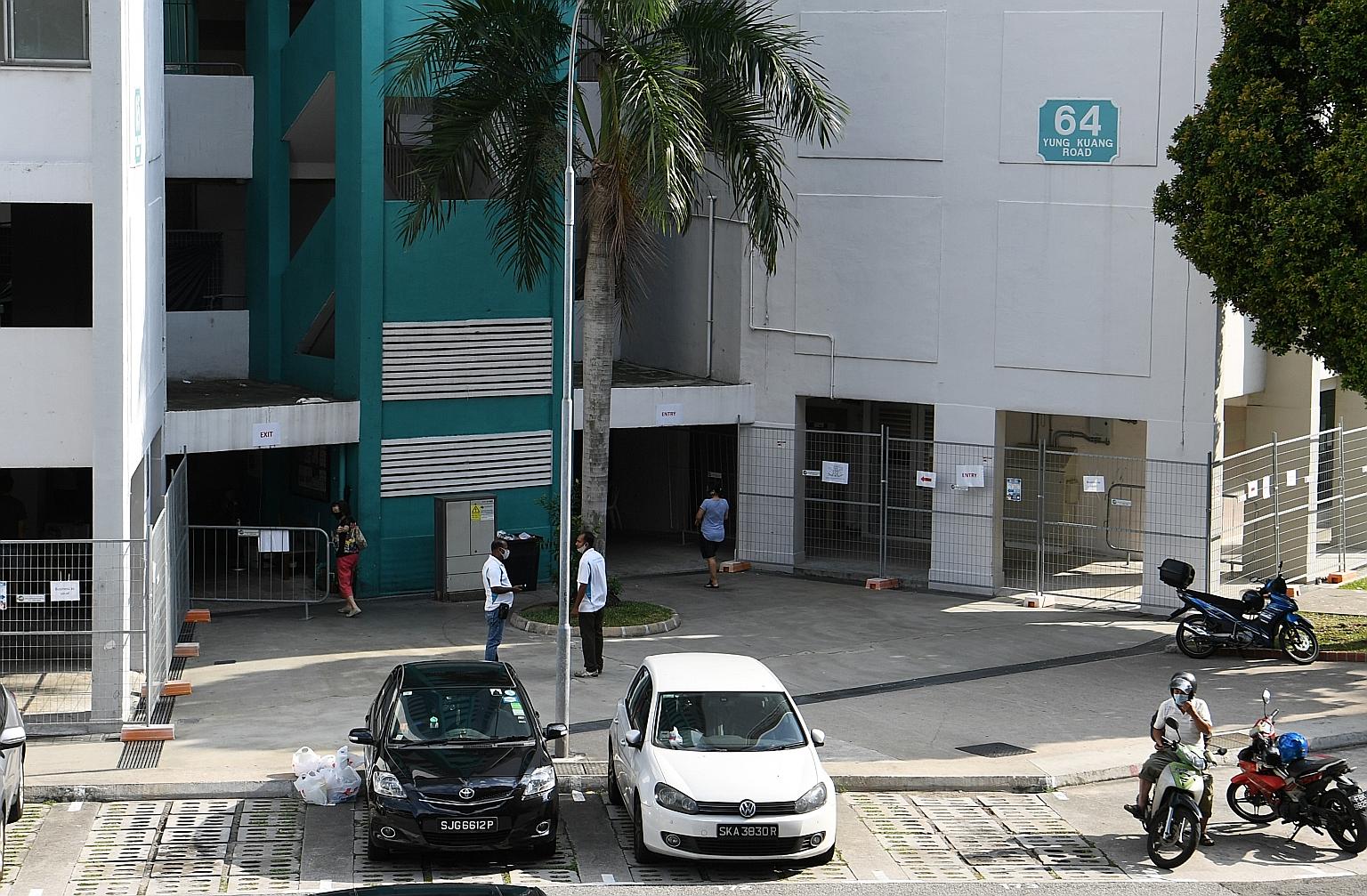 Works are ongoing to refurbish the vacant flats in blocks 63 to 66 in Yung Kuang Road in Taman Jurong to provide temporary housing for healthy foreign workers in essential services. ST PHOTO: KHALID BABA