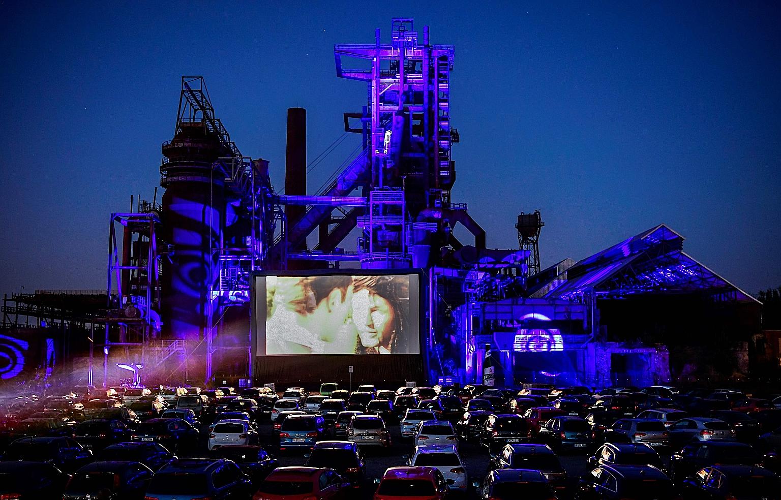 A new drive-in cinema in Dortmund packed with cars on Friday. Germany plans to take tentative steps this week to begin returning to normal life after a month-long lockdown.