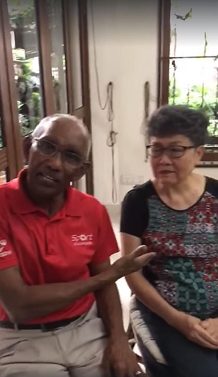 A video grab of Singapore Olympian C. Kunalan with wife Elizabeth at home. His message is to be positive during the circuit breaker.