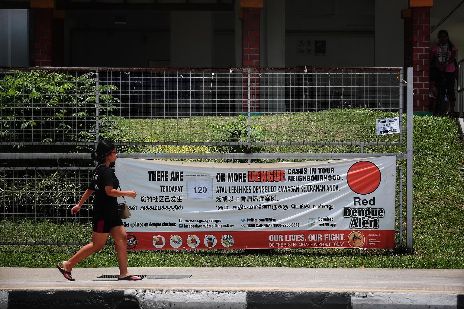 A banner showing the 120 dengue cases in the Ang Mo Kio area in this photo taken on March 24. ST PHOTO: KELVIN CHNG