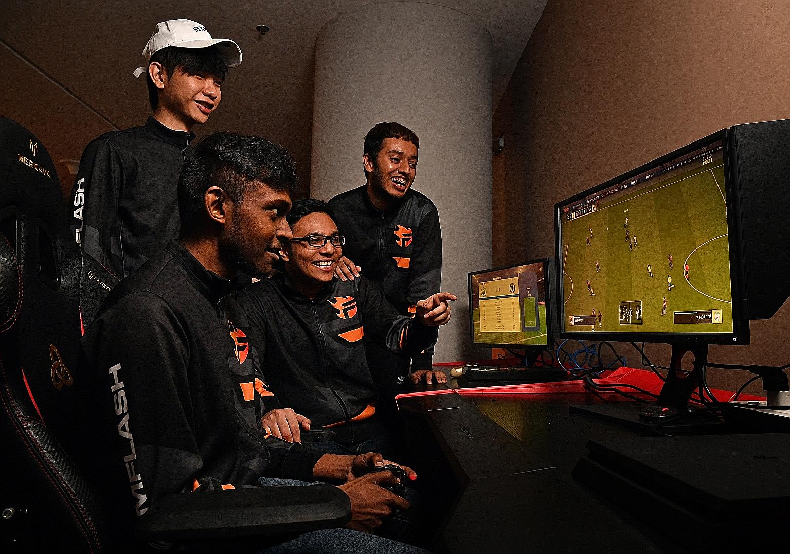 Singapore will be represented by Amraan Gani (left, seated) and Tampines Rovers' Joel Chew (not in photo) in the Fifa eNations Cup today. ST FILE PHOTO