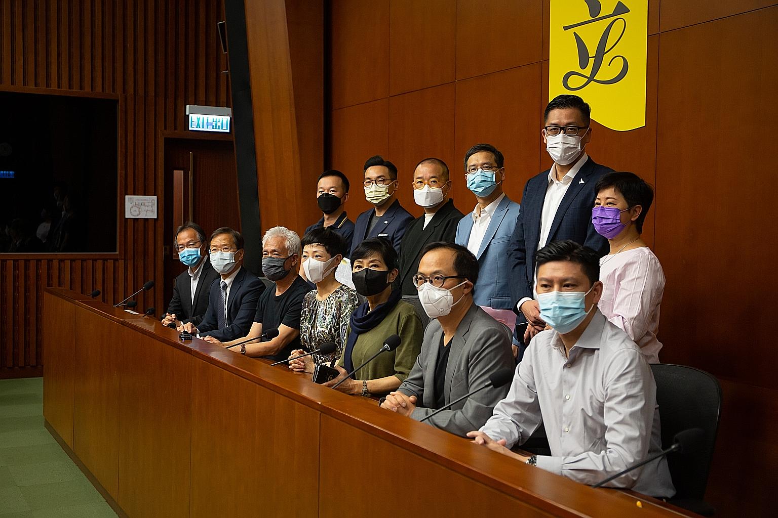 Pro-democracy Legislative Council members at a news conference in Hong Kong on Monday. PHOTO: BLOOMBERG